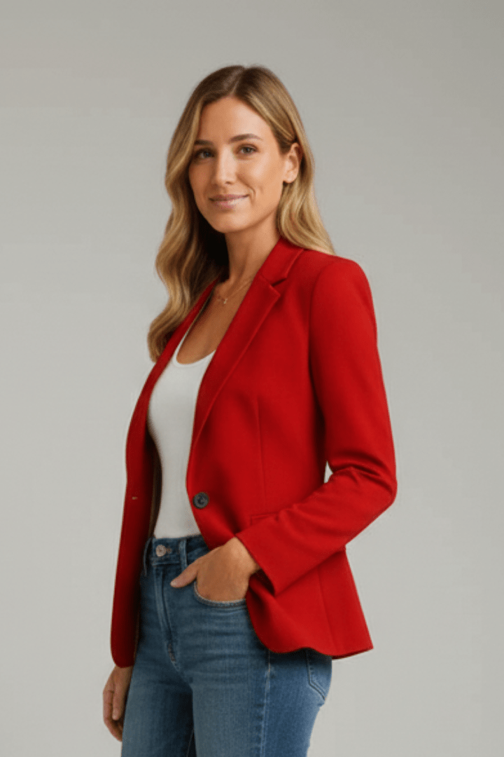 Women's tailored black blazer featuring a notched lapel and single button design, perfect for both professional and casual occasions. 3