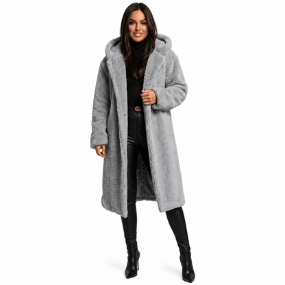 Women's plush teddy coat with a hood and button closure, featuring a relaxed fit, perfect for winter warmth and style. 8