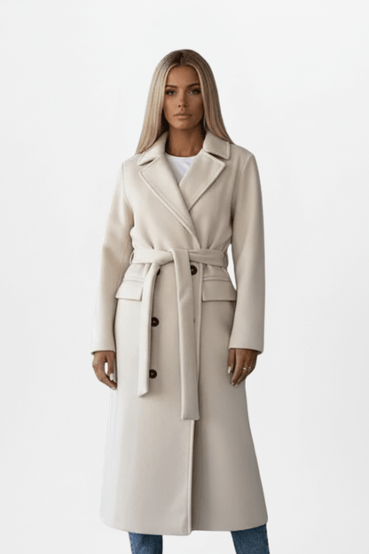 Women's trench coat with belt and double-breasted front, featuring a chic mid-length design suitable for both casual and formal wear. 0