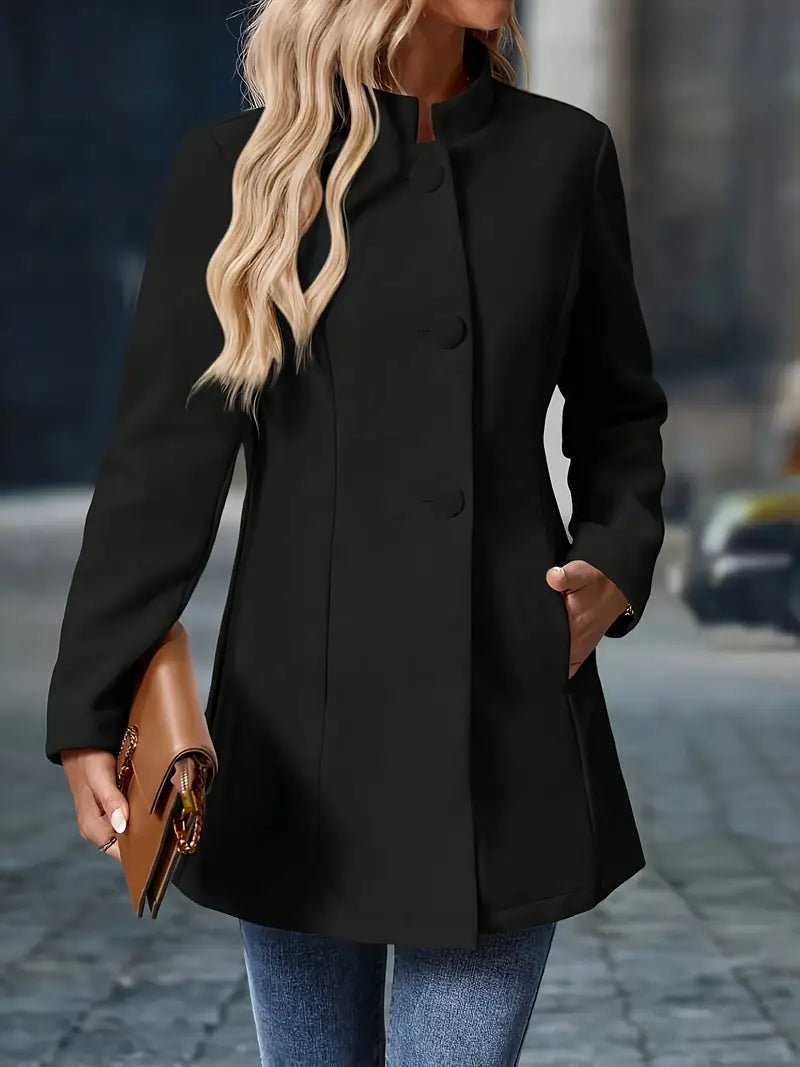 Women's black mid-length trench coat featuring a stylish stand collar and button front, complete with convenient side pockets for a chic and functional outerwear option. 6