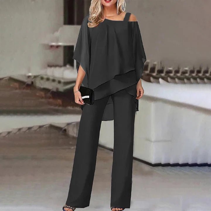 Women's two piece set featuring a stylish layered design and relaxed fit trousers, perfect for elegant casual outings or comfortable everyday wear. 1
