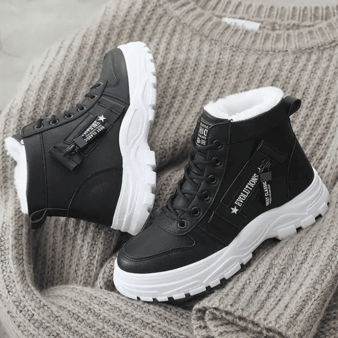 Women's waterproof insulated snow boots featuring an anti-slip sole, designed for modern winter adventures with a stylish look and superior warmth. 2