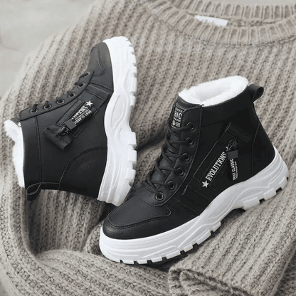 Women's waterproof insulated snow boots featuring an anti-slip sole, designed for modern winter adventures with a stylish look and superior warmth. 2