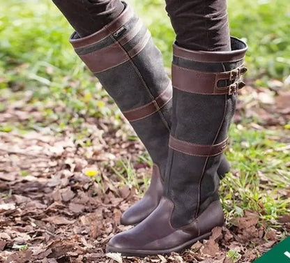 Women's waterproof knee-high boots featuring a stylish double buckle design and an easy pull-on style, perfect for all-weather wear. 0