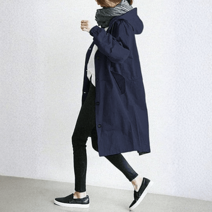 Women's lightweight waterproof rain jacket featuring an adjustable hood, perfect for outdoor adventures in wet weather. 3