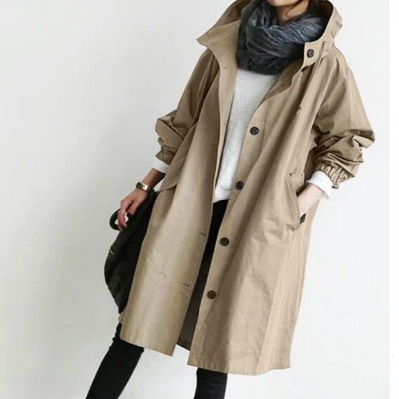 Women's lightweight waterproof rain jacket featuring an adjustable hood, perfect for outdoor adventures in wet weather. 0