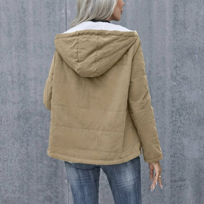 Women's winter jacket featuring a plush lining, structured hood, and zip-up design, perfect for keeping warm in cold weather. 2
