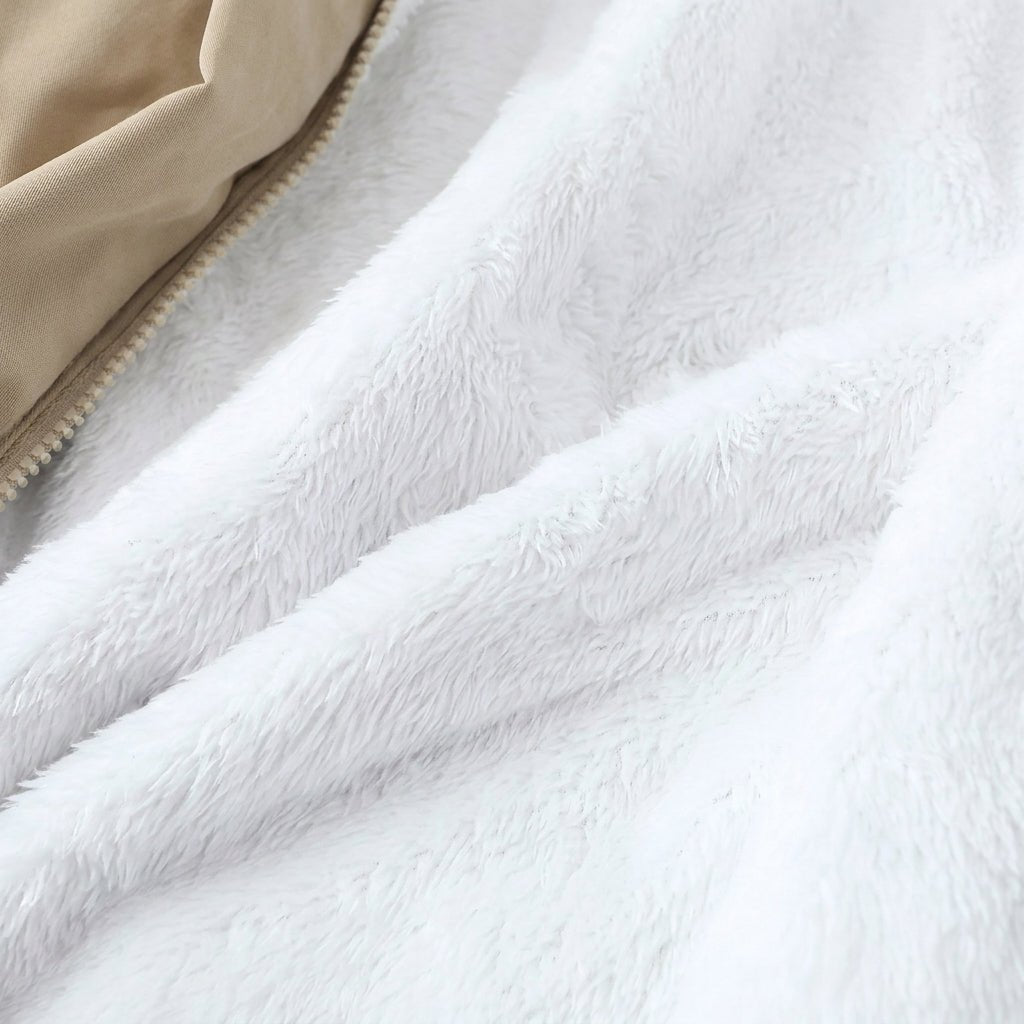 Women's winter jacket featuring a plush lining, structured hood, and zip-up design, perfect for keeping warm in cold weather. 5