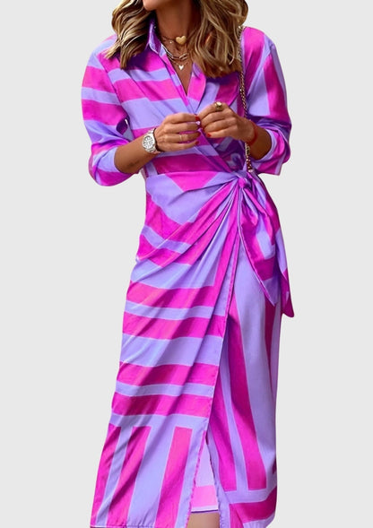 Elegant plus size women's wrap dress featuring an adjustable fit and modern print, perfect for summer outings and special occasions. 10