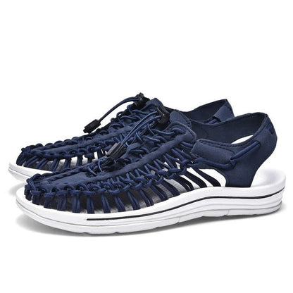 Woven beach sandals featuring a breathable design and lightweight flat sole, perfect for casual beachwear and summer outings. 7