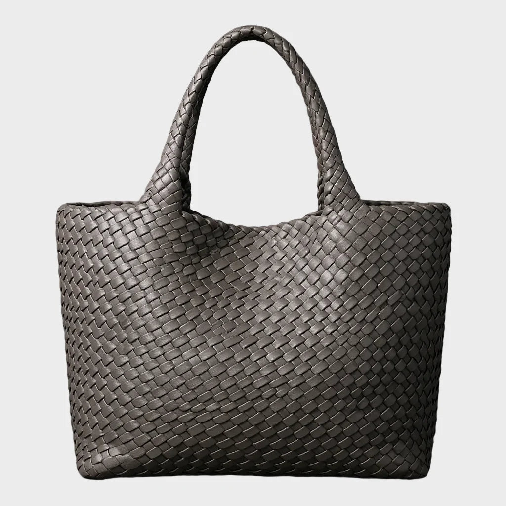 Woven leather tote bag featuring a spacious interior and comfortable handles, designed for everyday use with a timeless aesthetic. 5