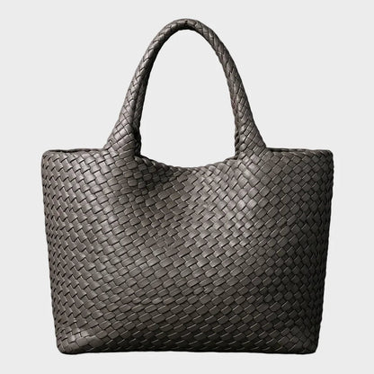 Woven leather tote bag featuring a spacious interior and comfortable handles, designed for everyday use with a timeless aesthetic. 5