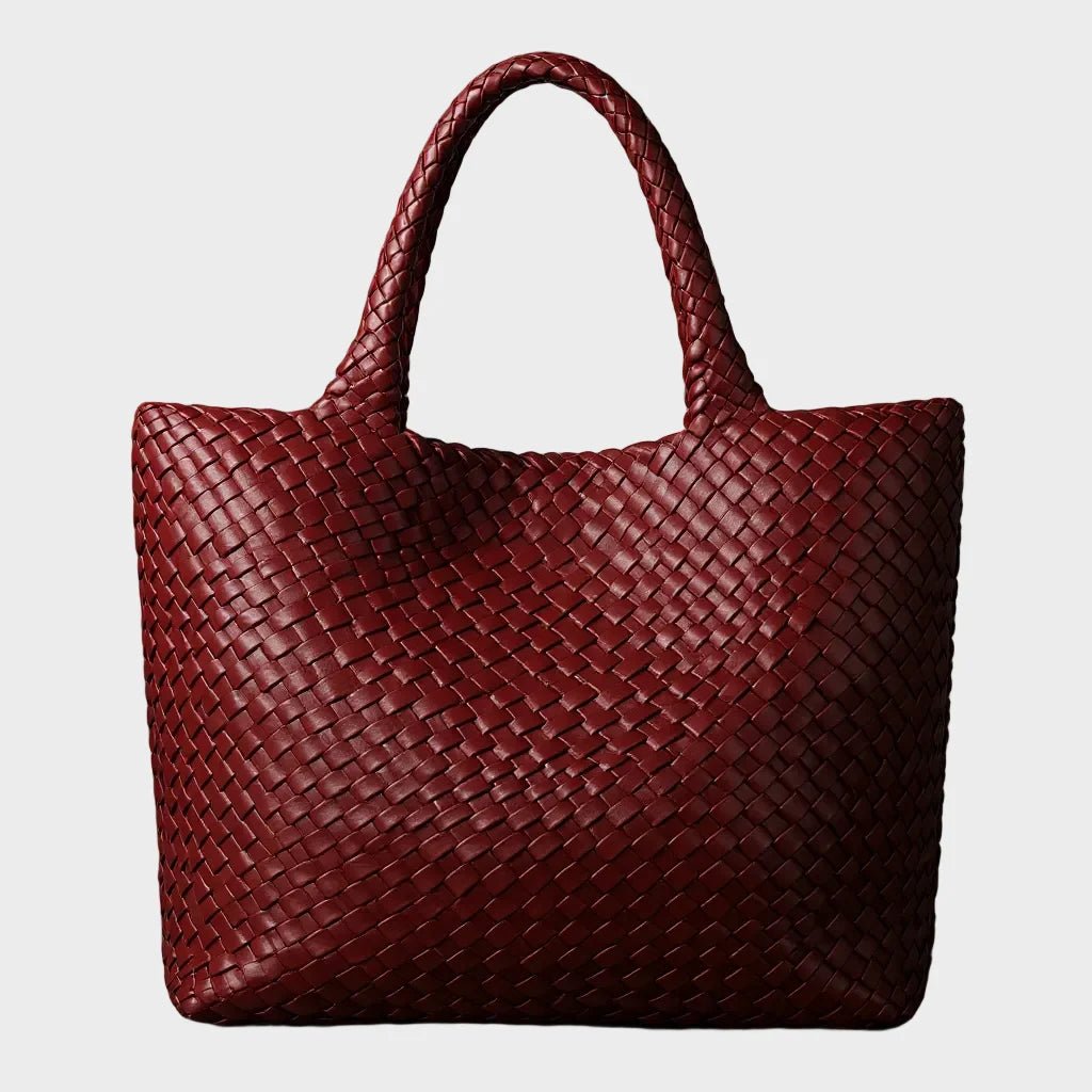 Woven leather tote bag featuring a spacious interior and comfortable handles, designed for everyday use with a timeless aesthetic. 3