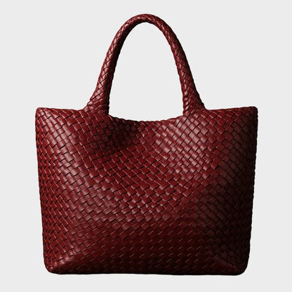 Woven leather tote bag featuring a spacious interior and comfortable handles, designed for everyday use with a timeless aesthetic. 3