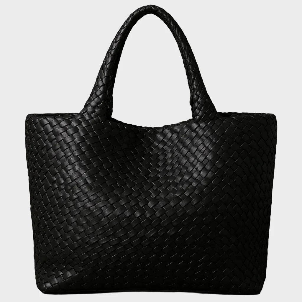 Woven leather tote bag featuring a spacious interior and comfortable handles, designed for everyday use with a timeless aesthetic. 7
