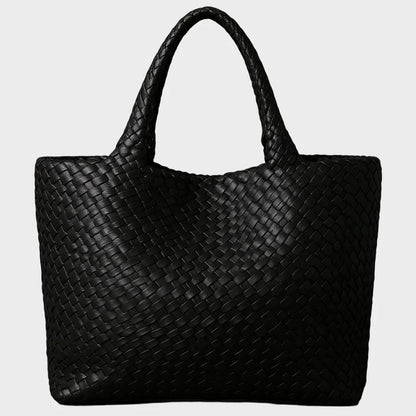 Woven leather tote bag featuring a spacious interior and comfortable handles, designed for everyday use with a timeless aesthetic. 7